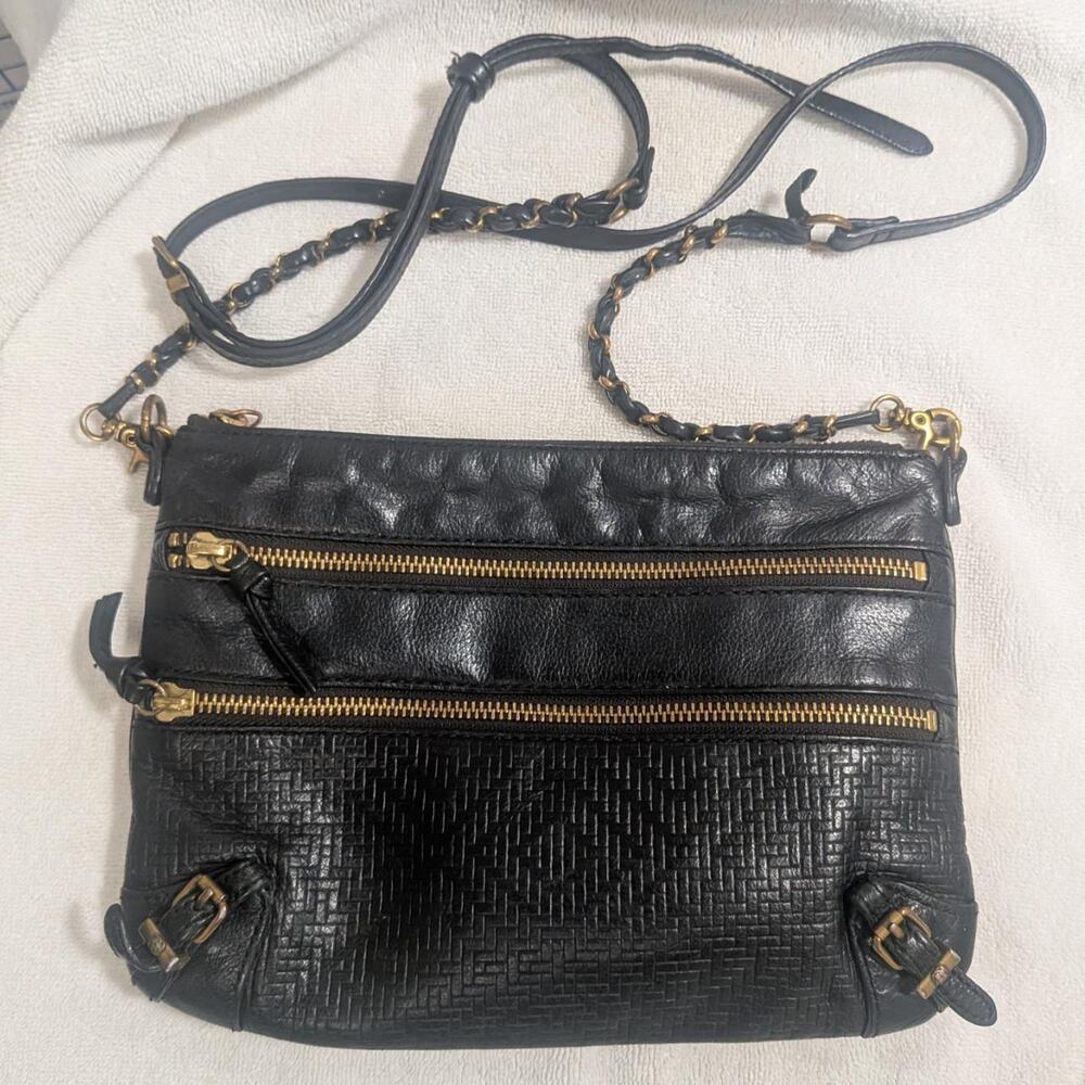 Elliott Lucca black genuine leather crossbody bag with gold zippers